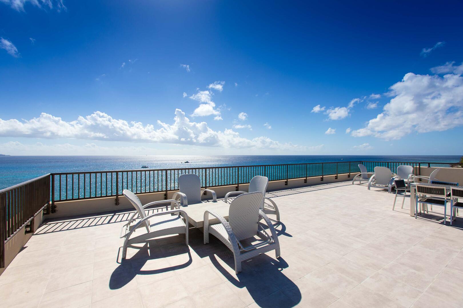 Head to the rooftop lounge for mesmerizing views of Seven Mile Beach.