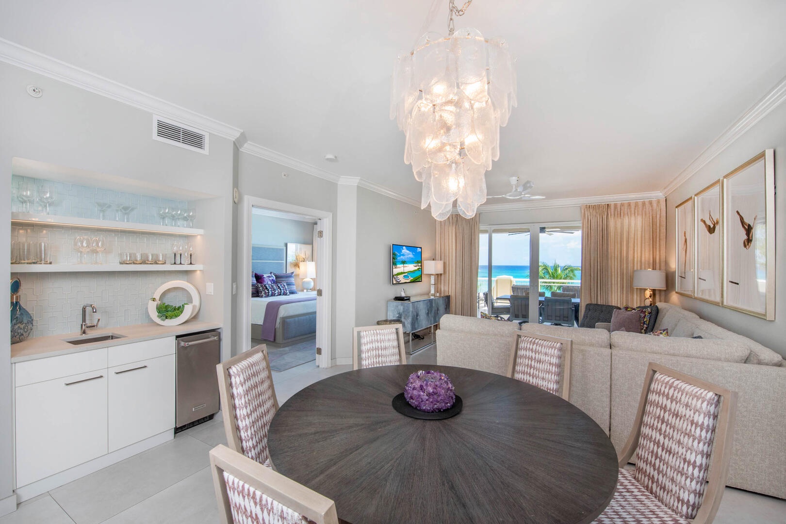 Dining area with table that seats 6.