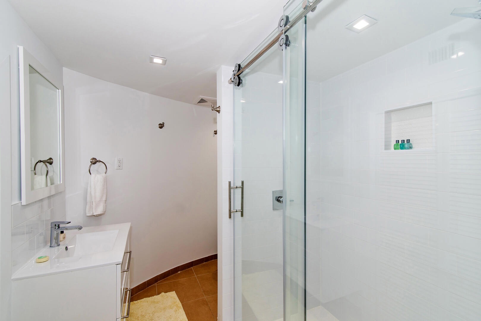 Bunk suite bathroom with shower.