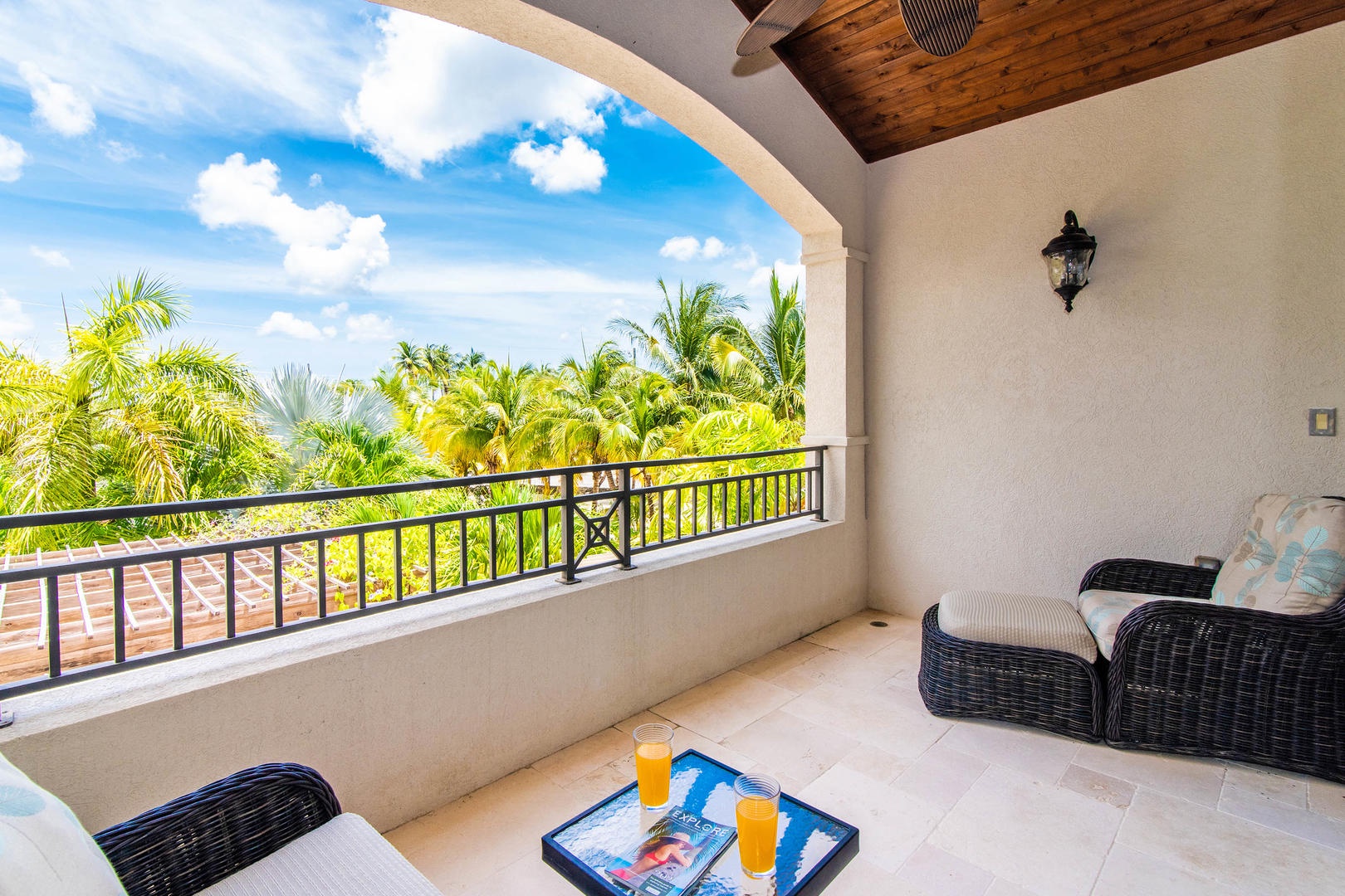 Open air balcony overlooking the front of the home off of the TV loft.