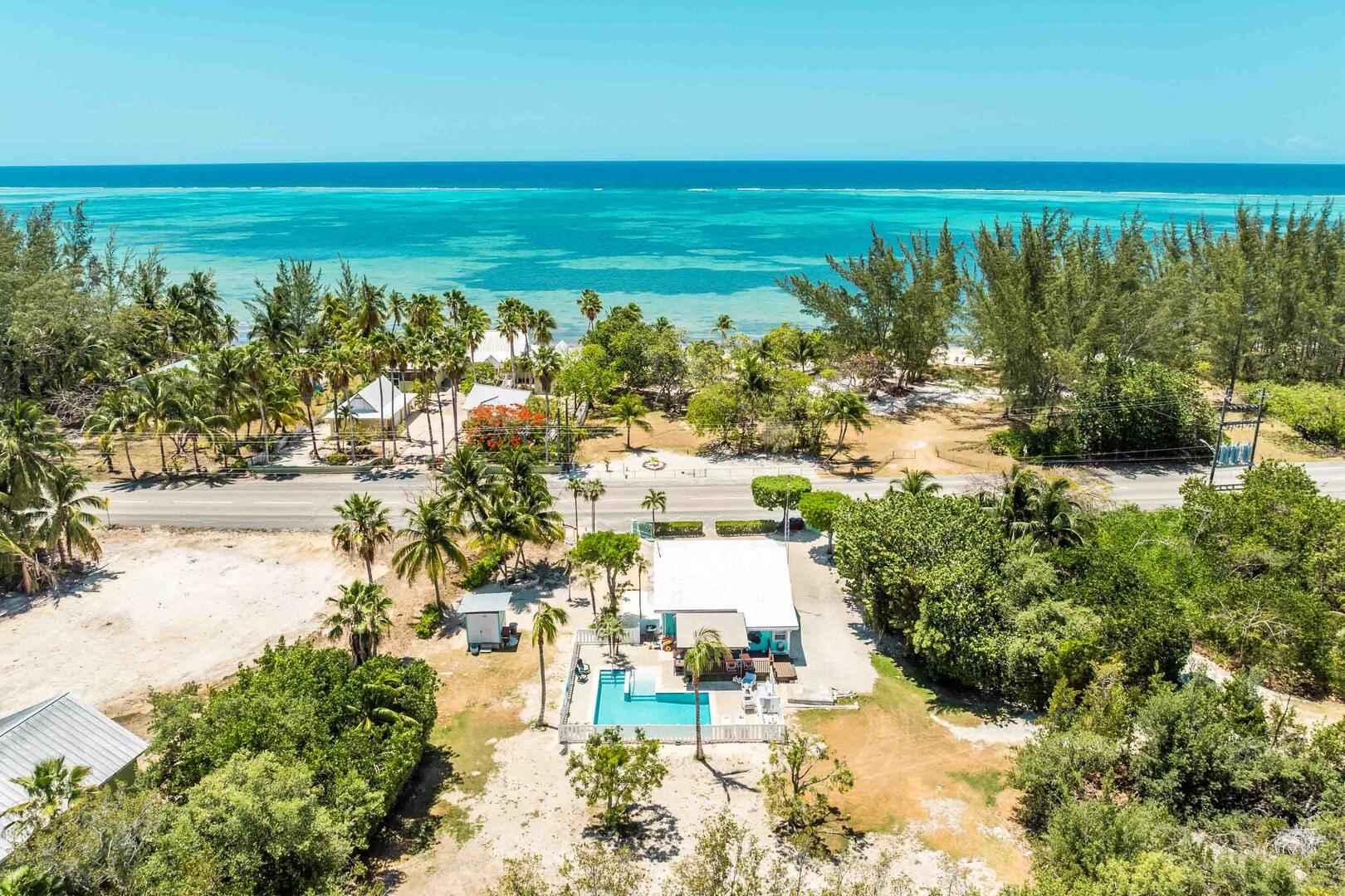 Aerial of Sea Beauty and the private beach lot across the street.