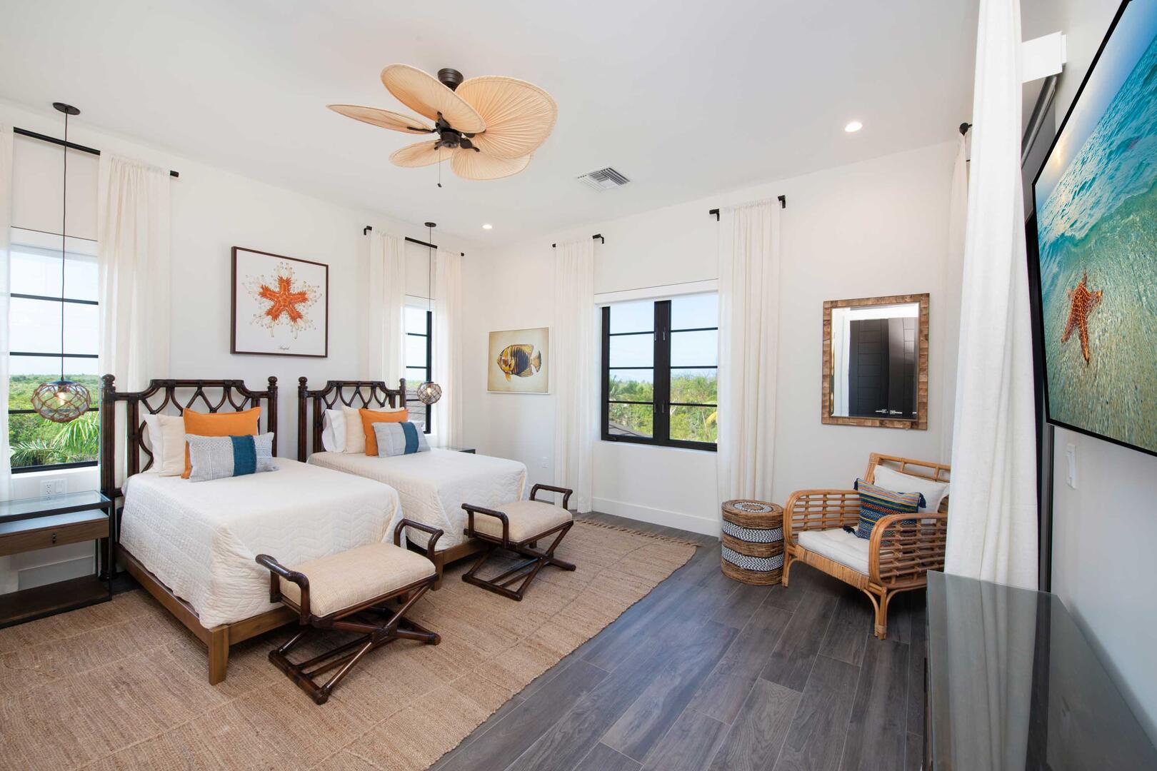 Twin Suite ? upper-level, 2 twin beds, oceanview, walk-out access to a private balcony, vaulted ceilings, SmartTV.