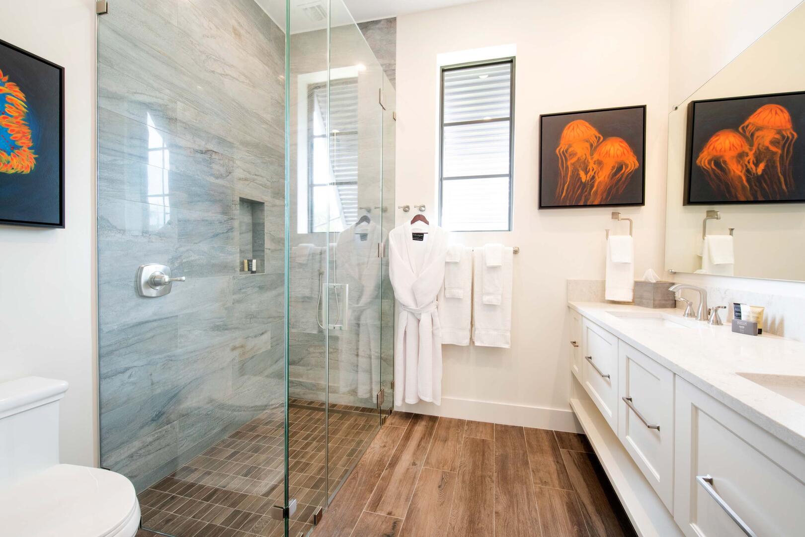 East Suite ensuite bath with tiled shower.