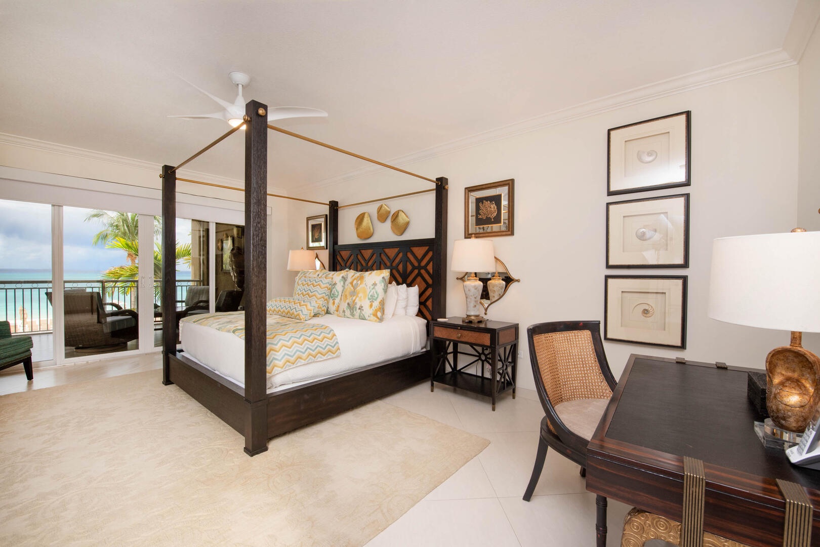 The primary suite is also furnished with a desk and chair for remote workers.