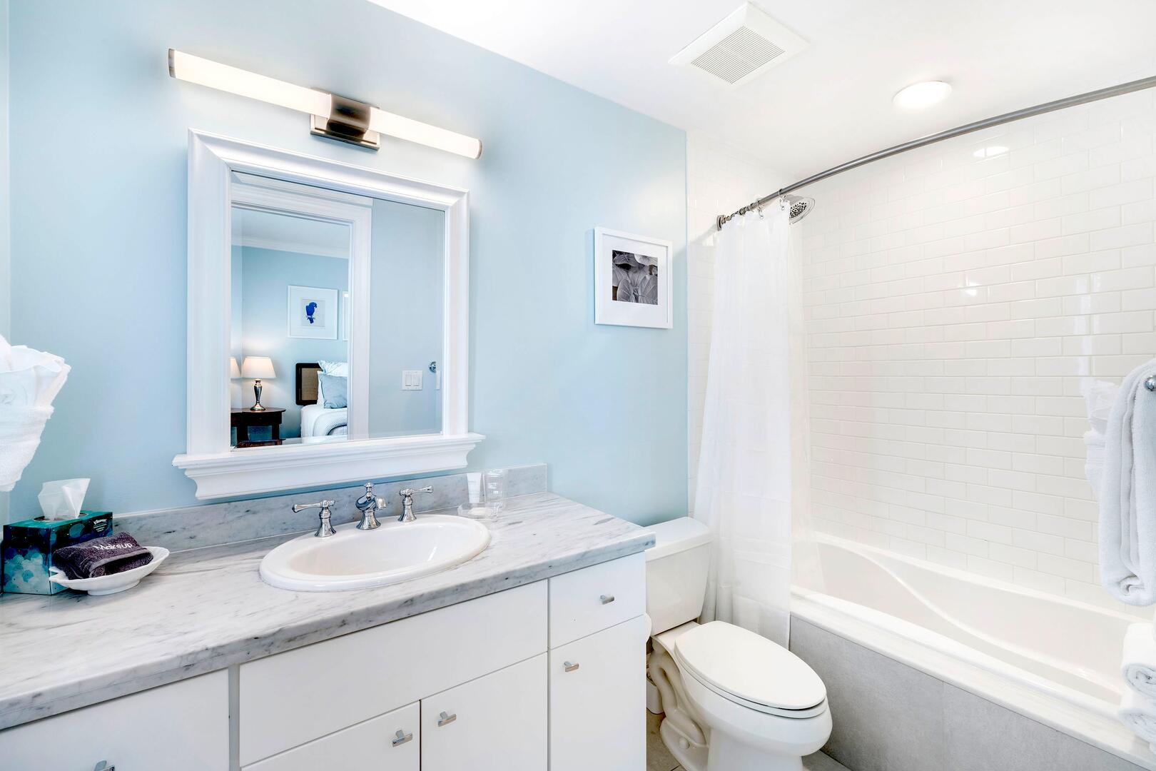 Bedroom 2 ensuite with shower bath. All beach and bath towels are provided during your stay.