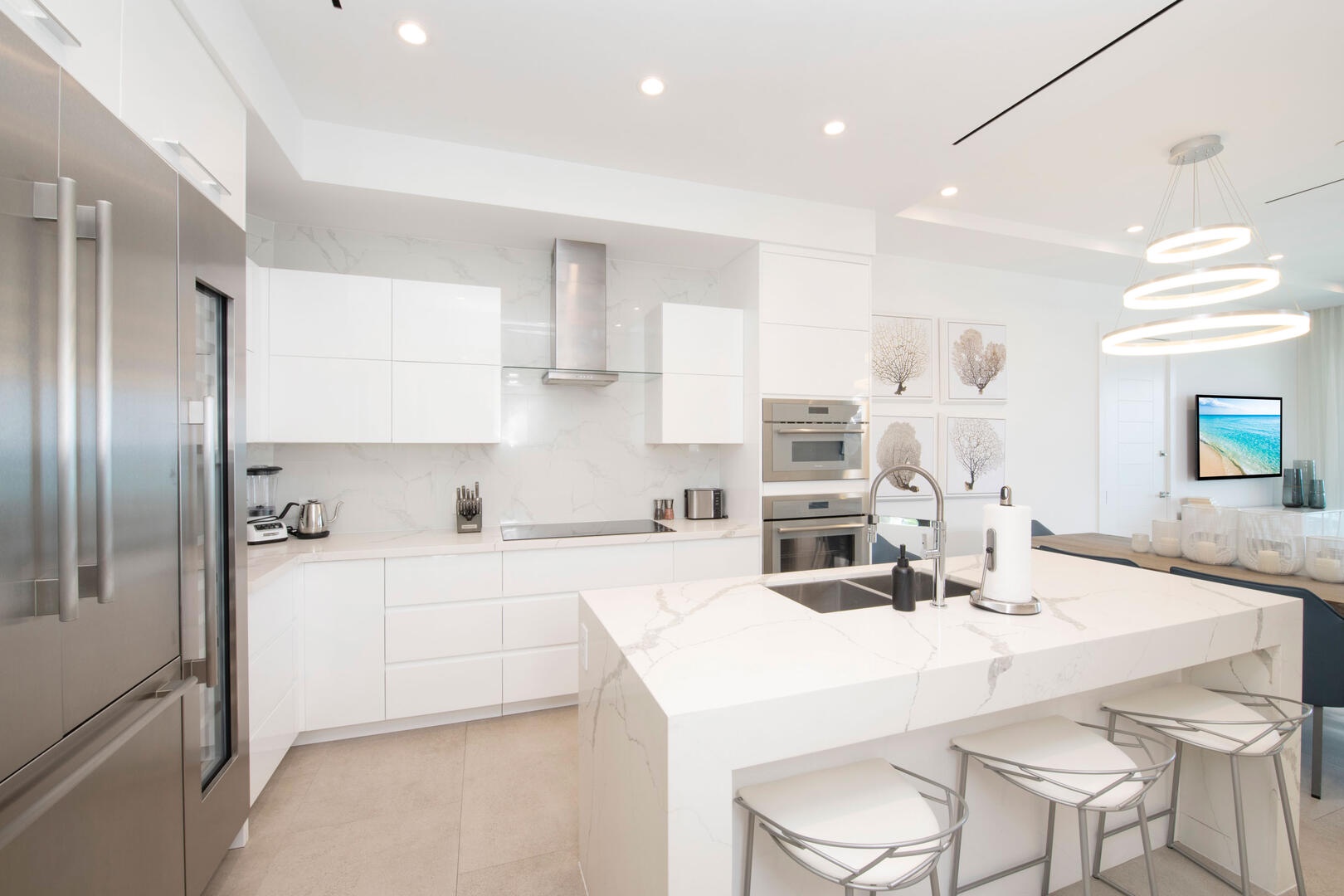 Top of the line appliances and kitchen island seating for 3.