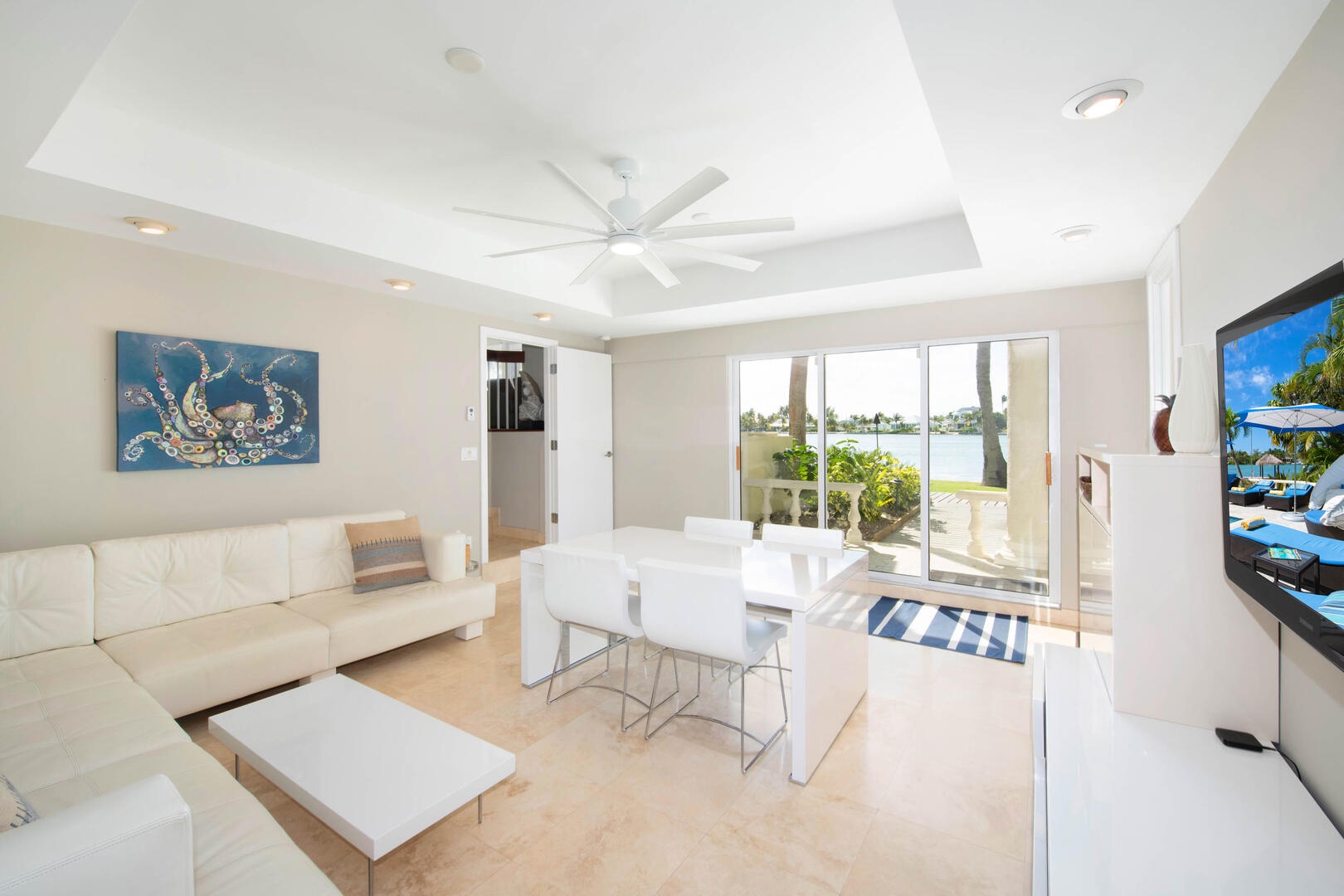 Lower level media den with walkout access to the beachfront.