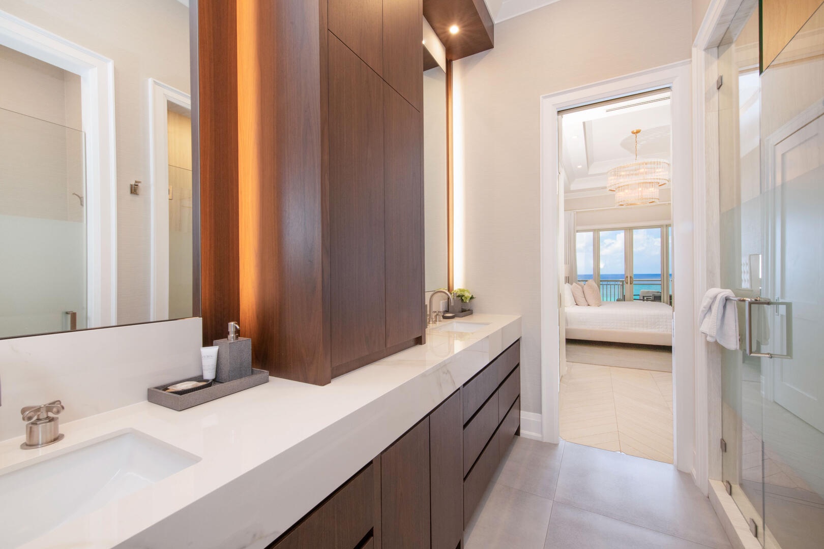Primary ensuite with double vanity and shower.