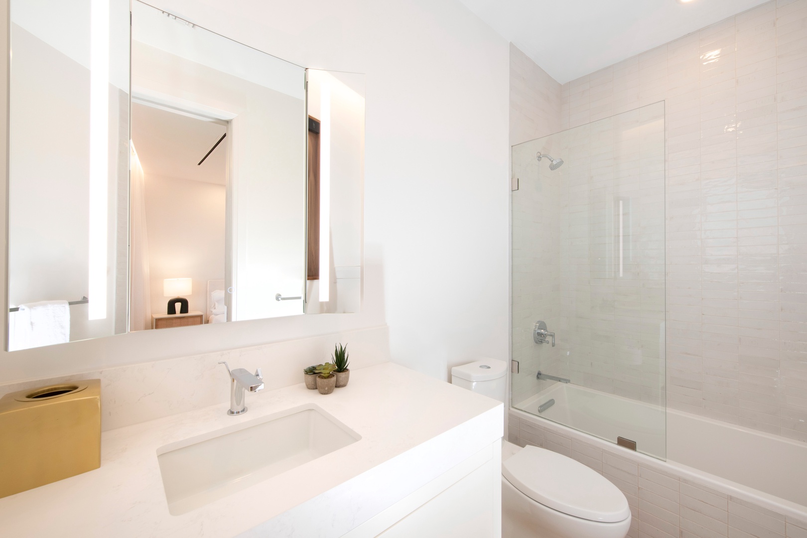 Bedroom 3 ensuite with shower bath.