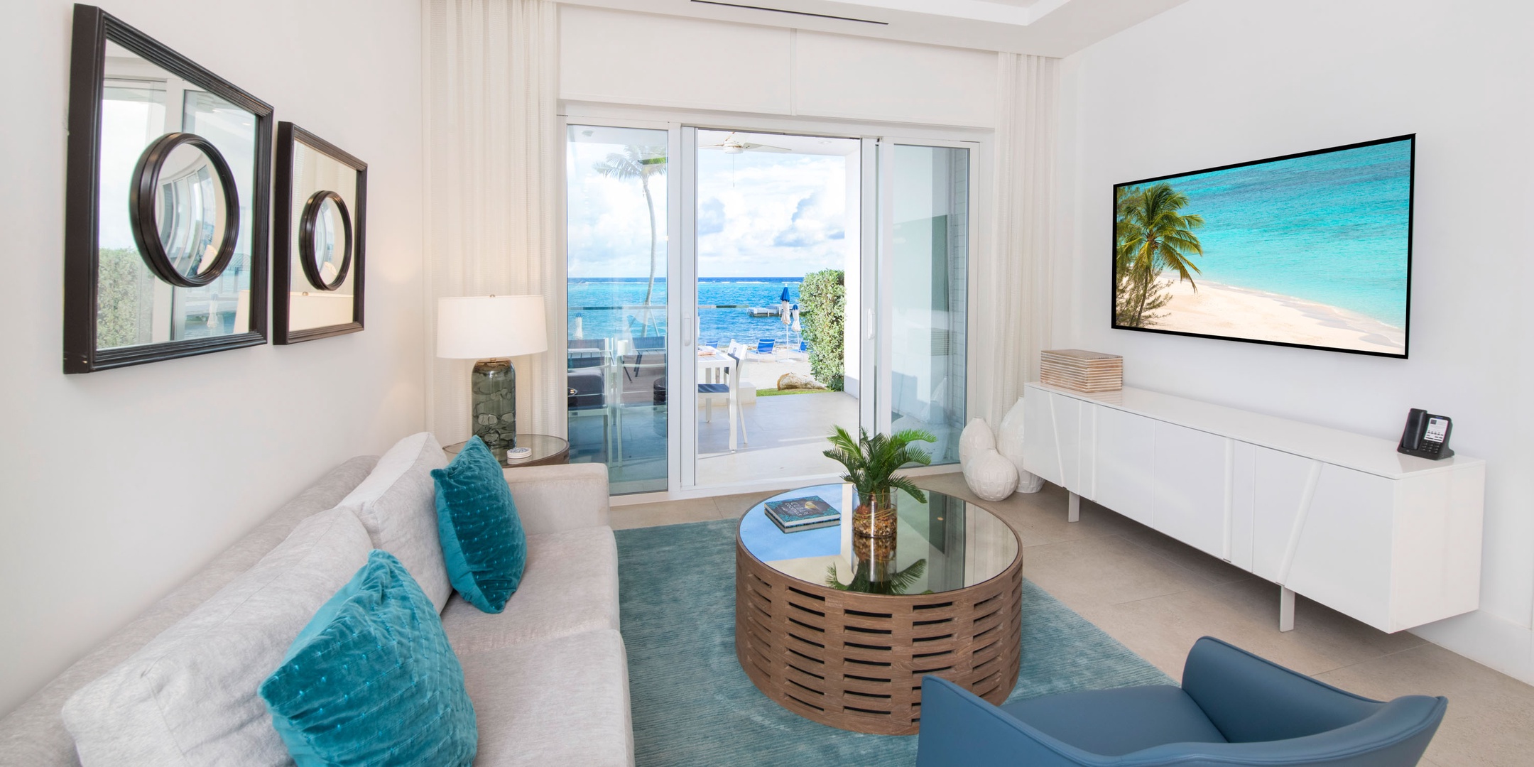 Second living area with walkout access to the ocean terrace.