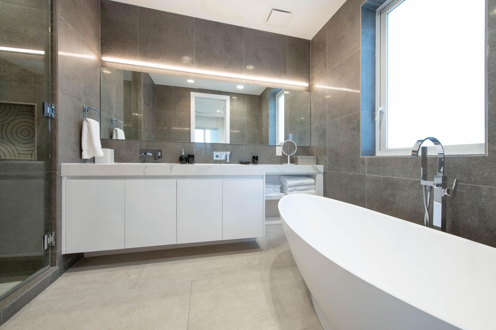 Primary ensuite with soaking tub and shower.