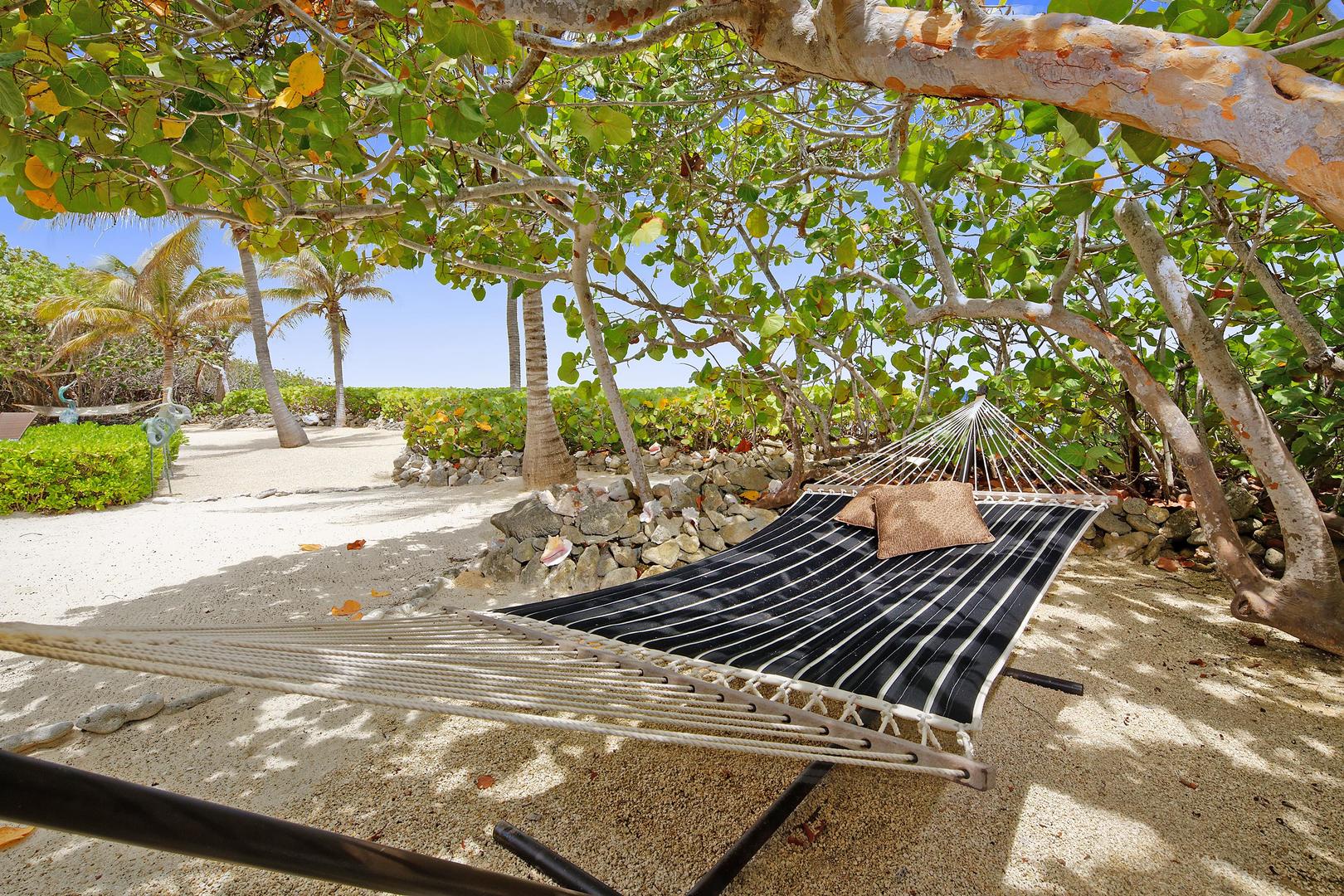 Relax in the hammock under the trees. Perfect for an afternoon catnap.