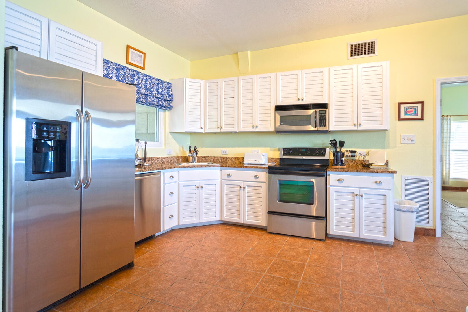 The guesthouse comes equipped with a full kitchen and appliances.