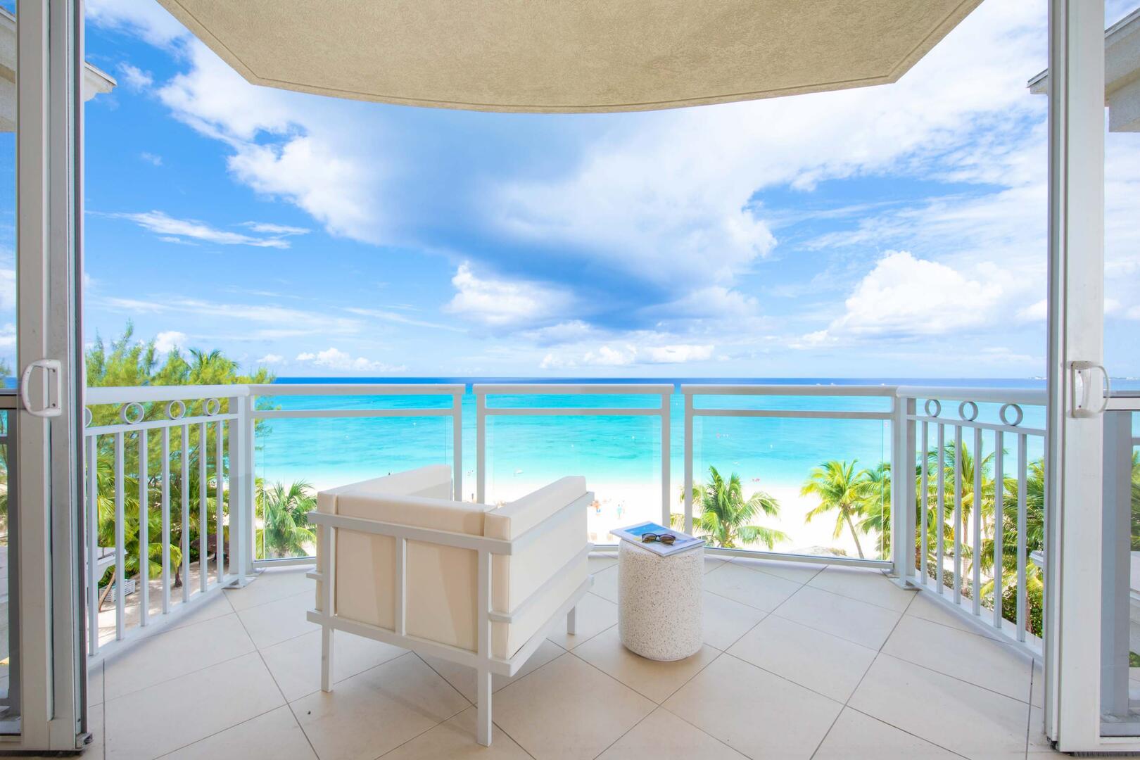 Start your mornings with dazzling views of Seven Mile Beach.