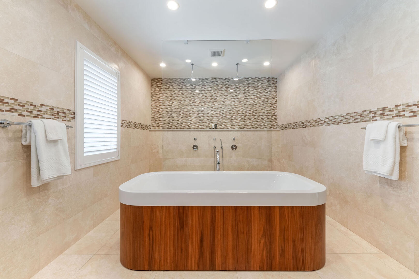 East Primary Ensuite soaking tub and dual rainfall showers.
