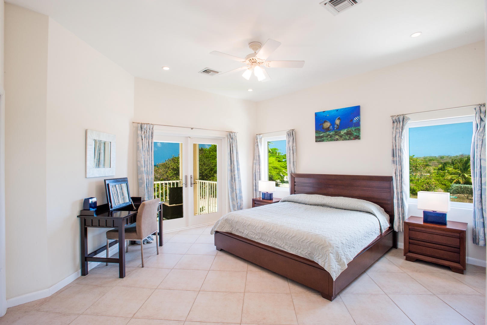 Upstairs Guest Bedroom with a private screened porch.