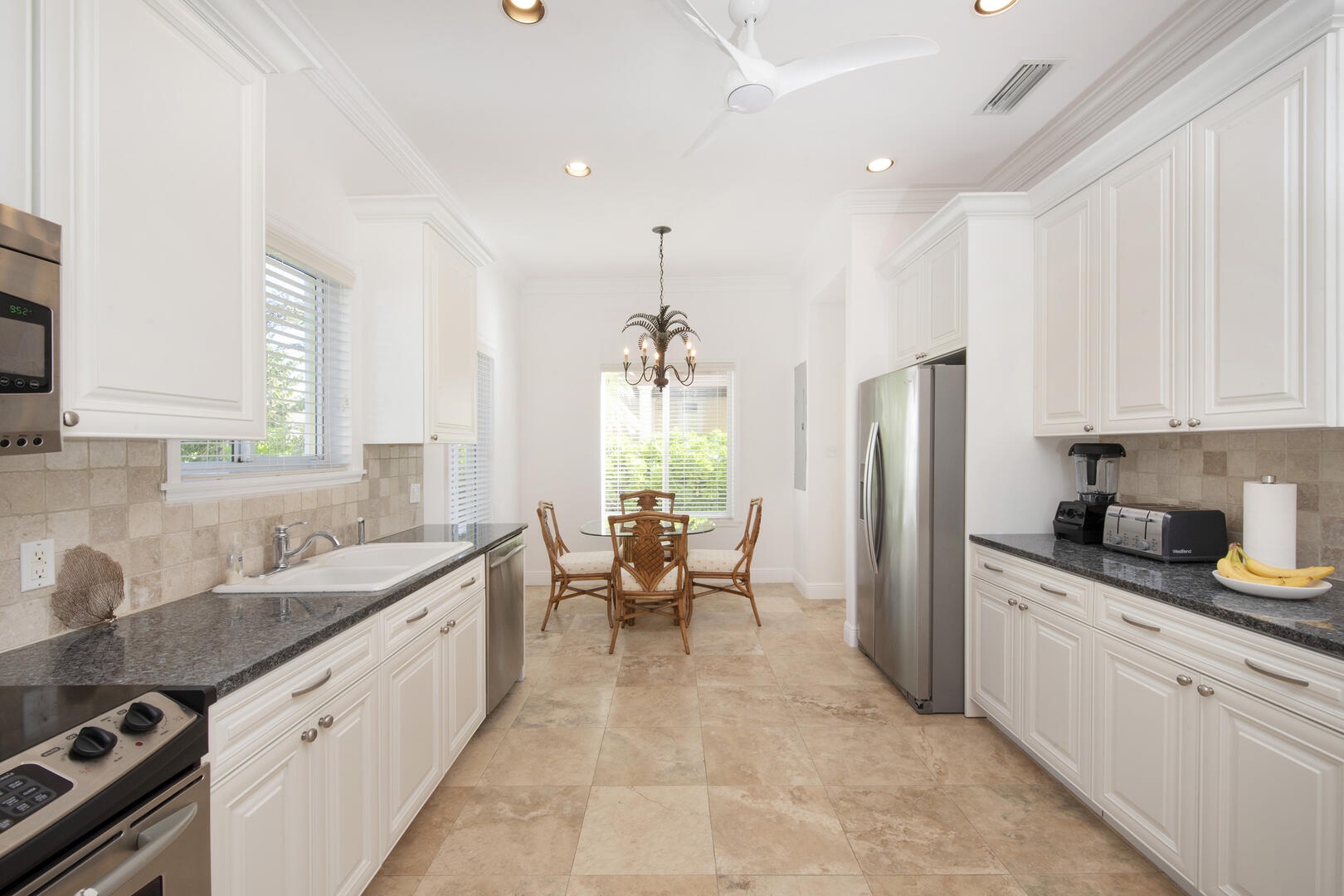The kitchen comes equipped with cookware, flatware, glassware, and cutlery.