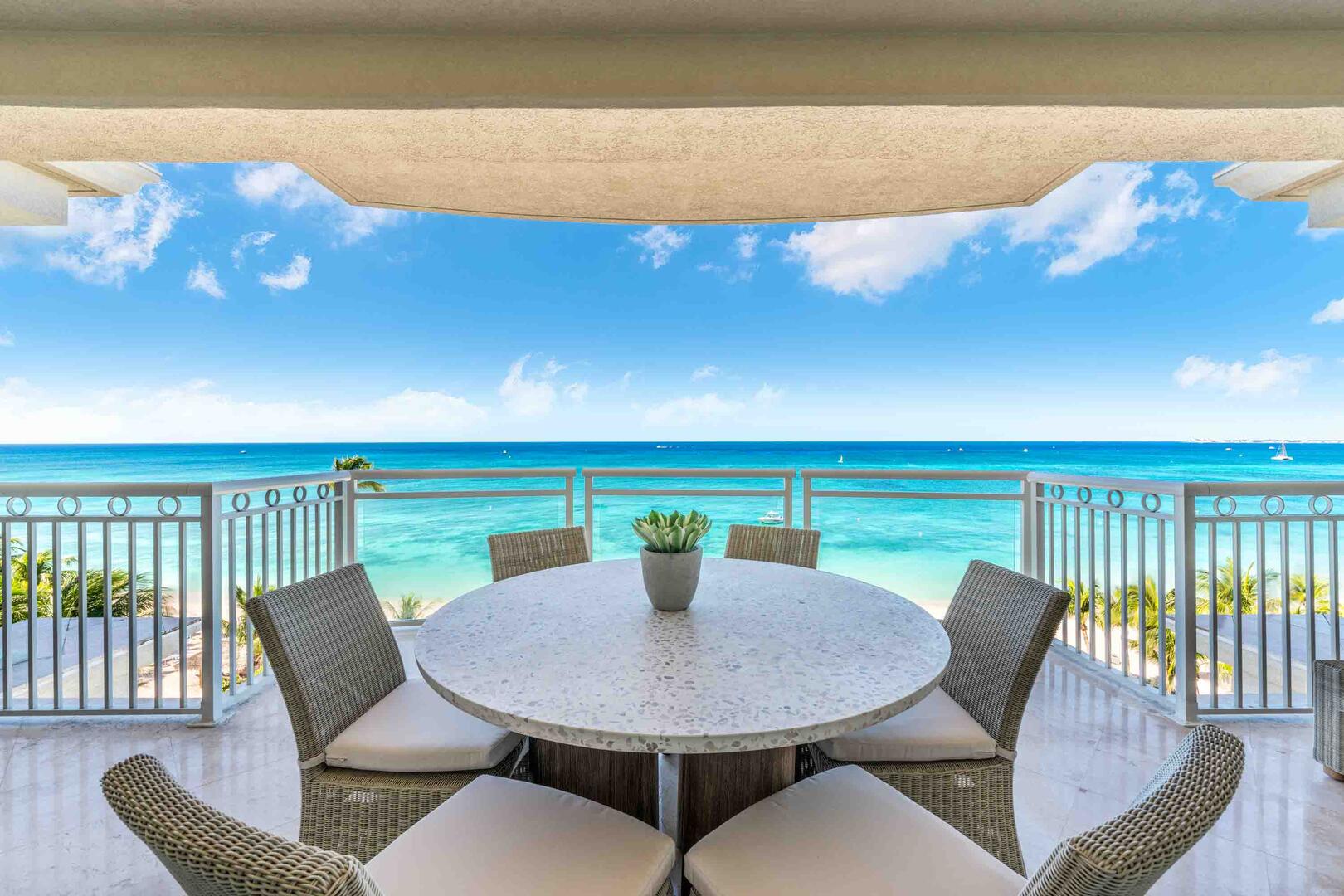 Savor alfresco meals with elevated seaside views from the condo's private balcony.