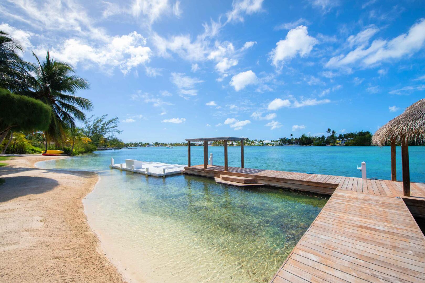 Kaiku's private dock and floating dock. Book a charter and have the captain collect your party right off the villa's dock!