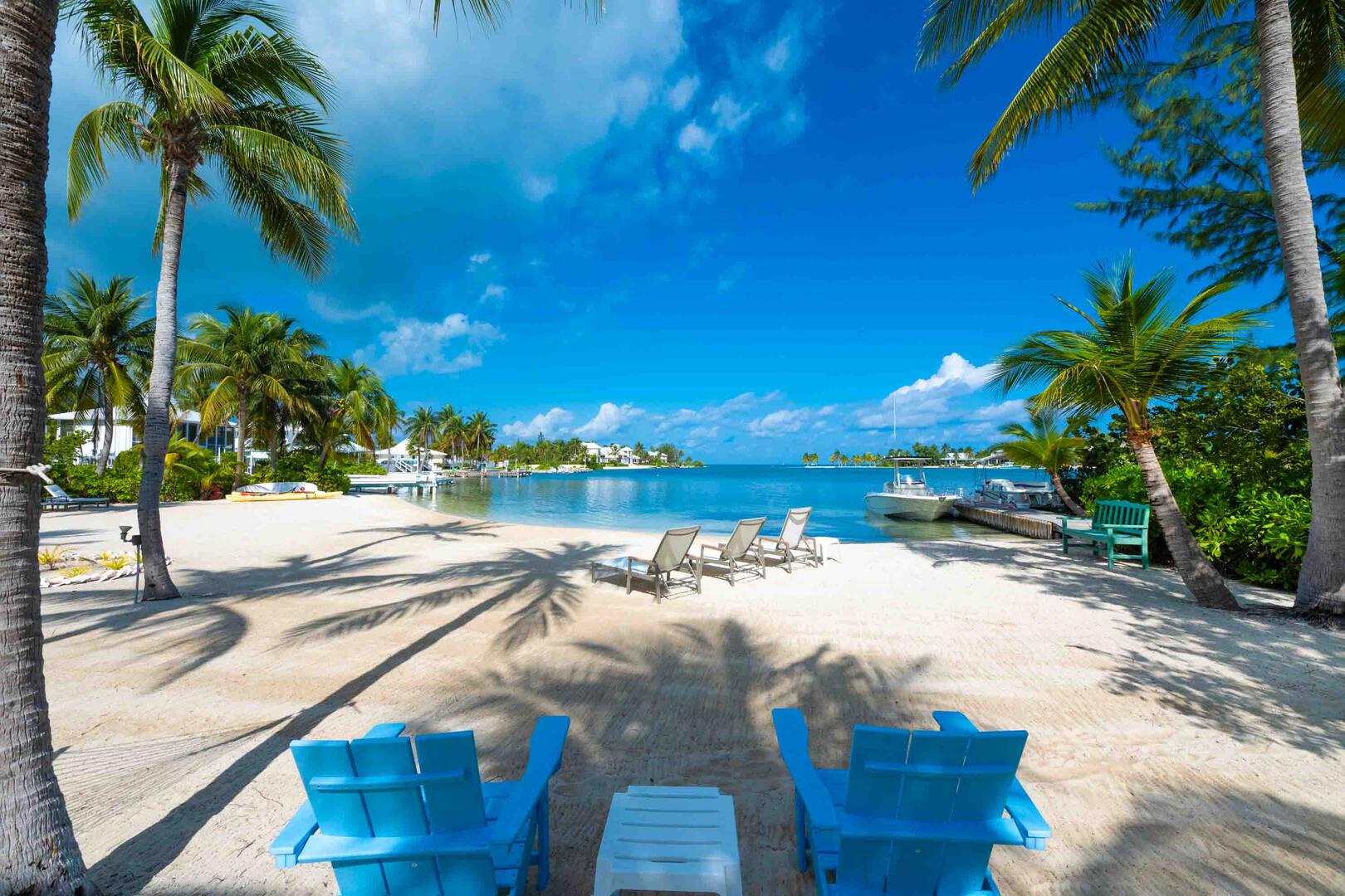 Beach Adirondack chairs to enjoy the dazzling waterfront views.