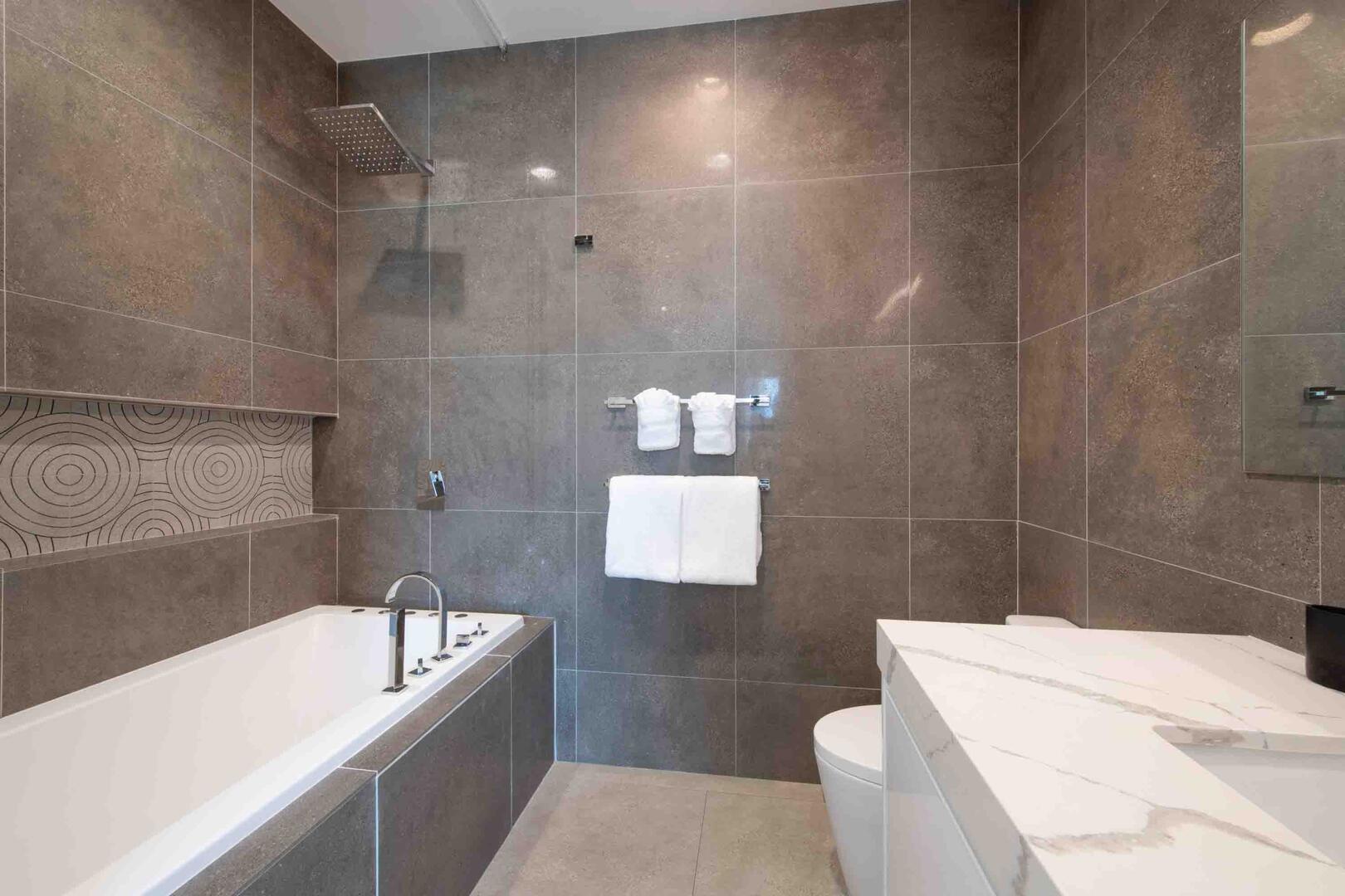 Guest Ensuite #1 with shower bath.