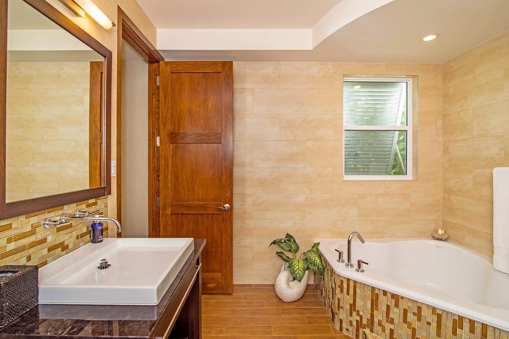 Master bath with a soaking tub and walk-in shower.