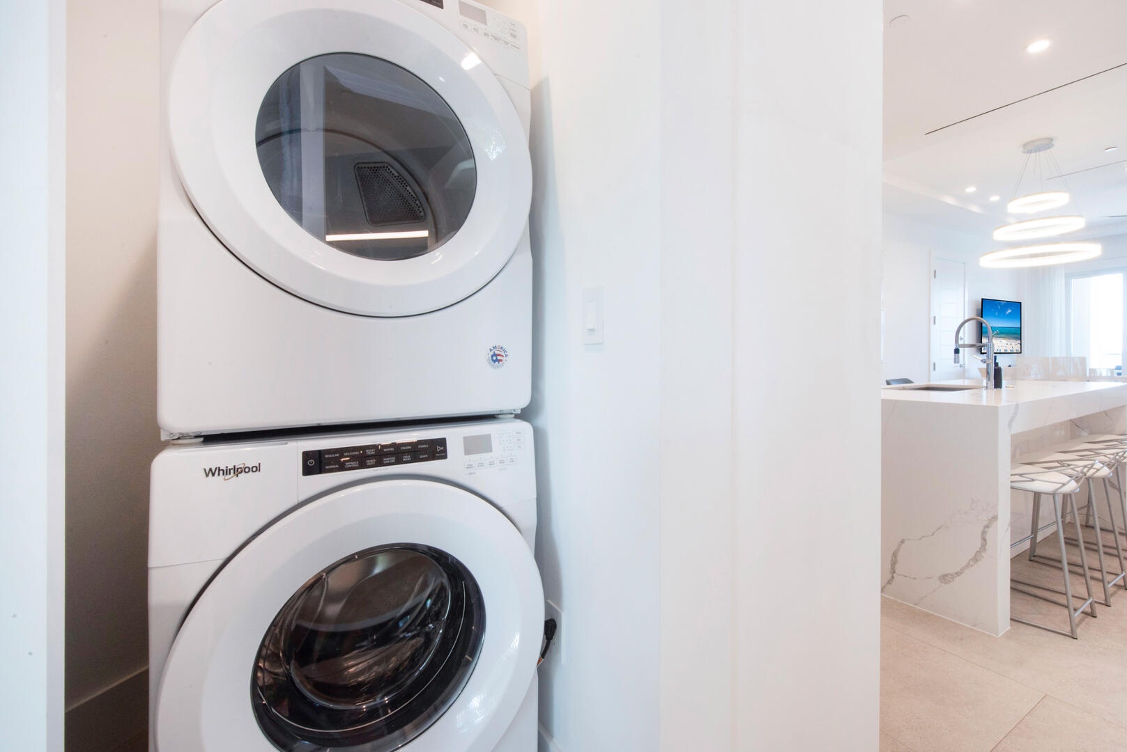 In-unit laundry area just off the kitchen.