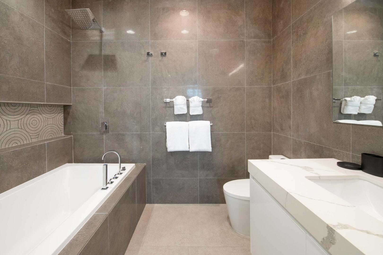 Guest Ensuite #1 with shower bath.