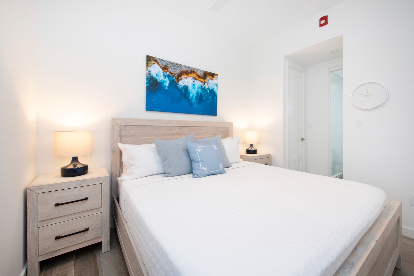 Bedroom 2 with queen bed and television