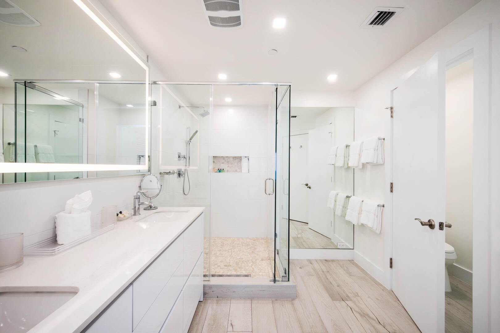 Master ensuite with double vanity and large shower.