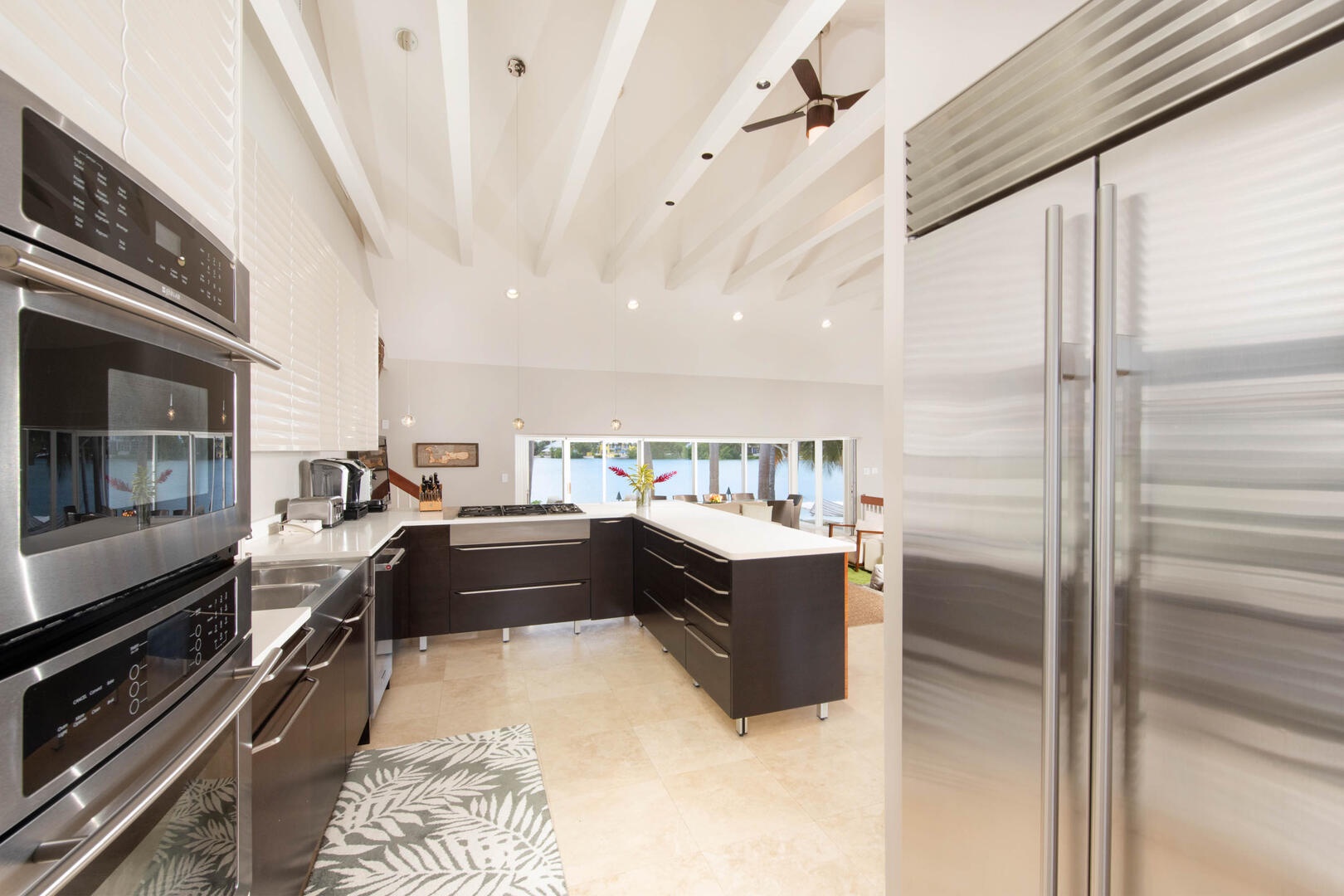 Kitchen with modern appliances. Both a Keurig and drip coffee maker are provided.