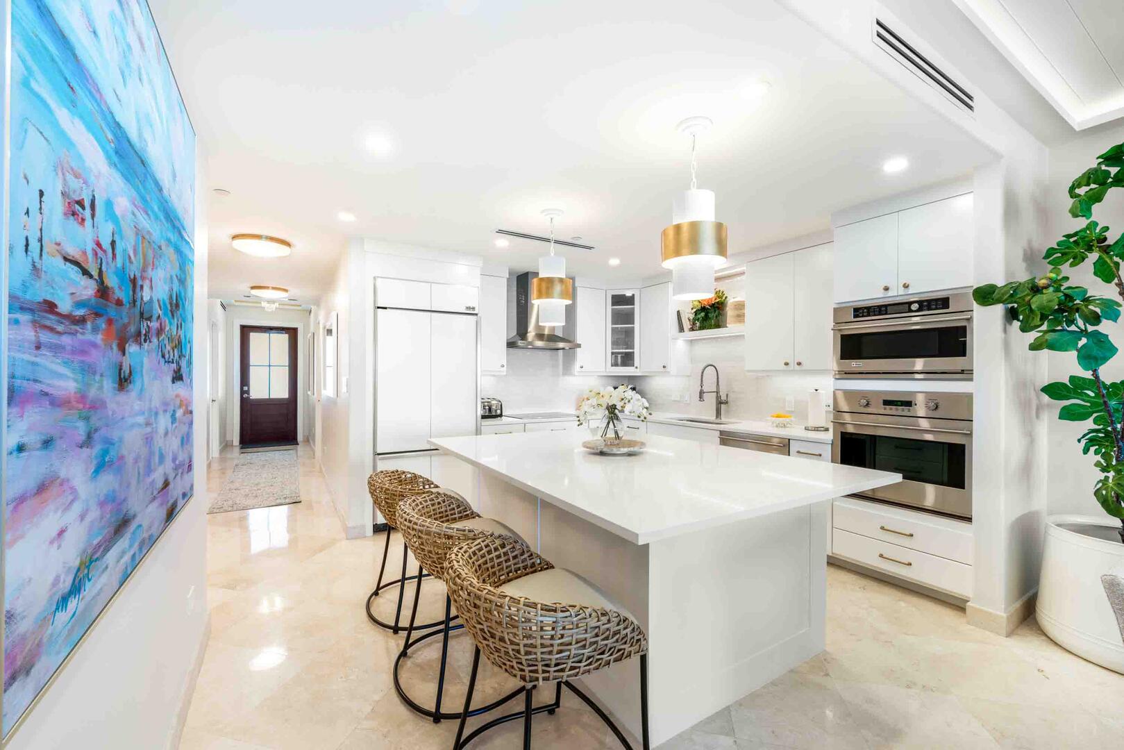 Large kitchen island with seating for 3.