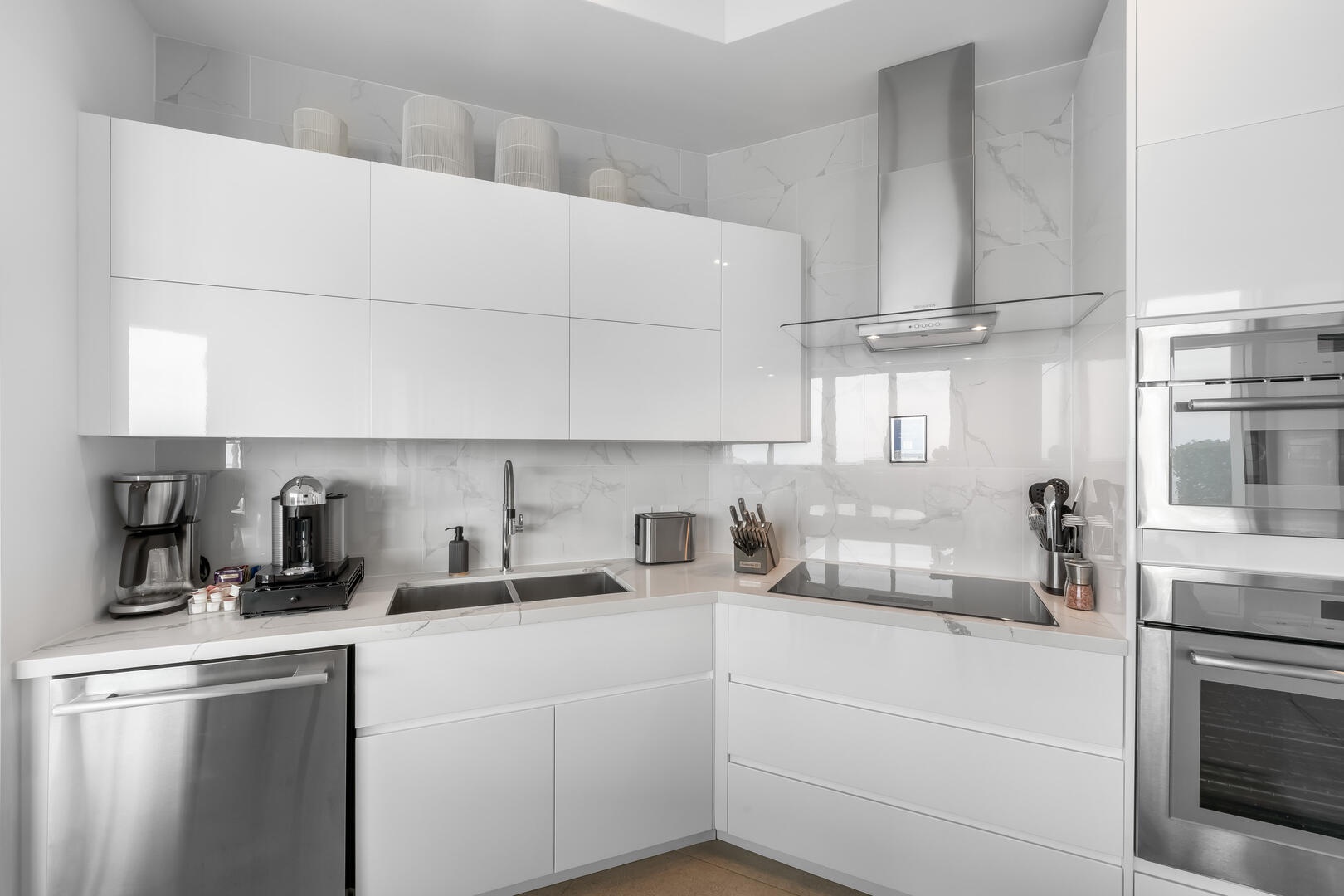 Kitchen with drip coffee and Nespresso machine.
