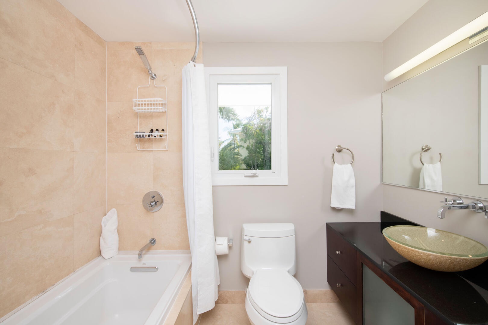 Both Guest Bedrooms share this Jack & Jill bathroom with shower bath.