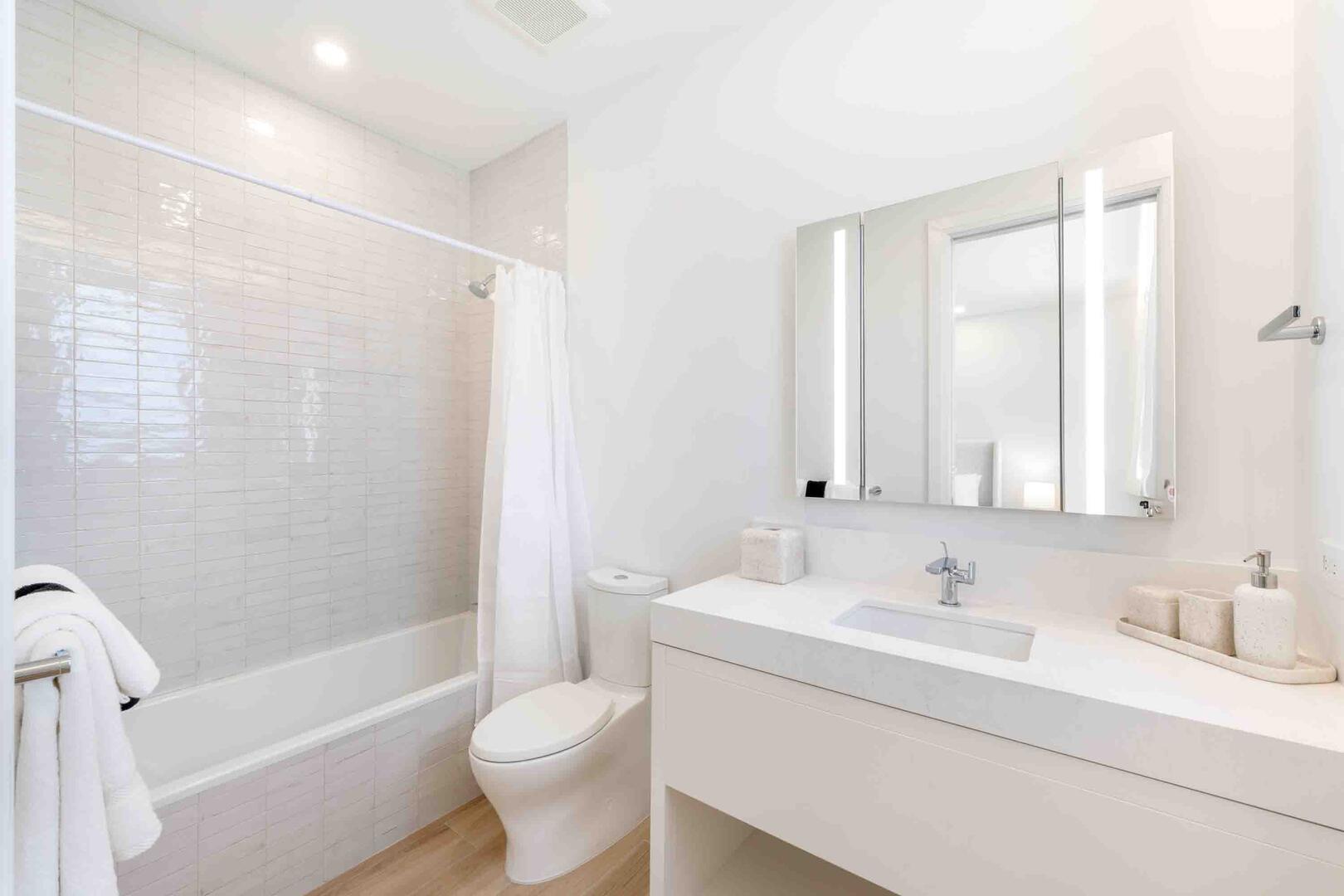 Bedroom 2 Ensuite equipped with a shower bath.