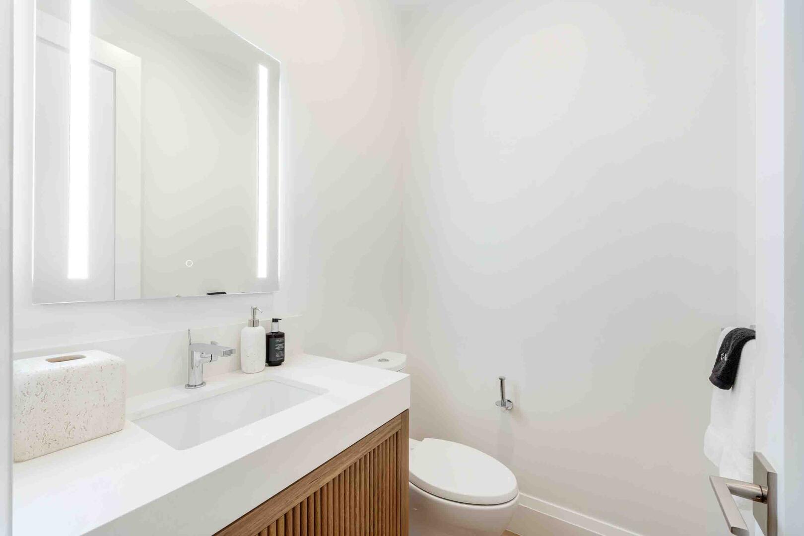 Powder room off the foyer.