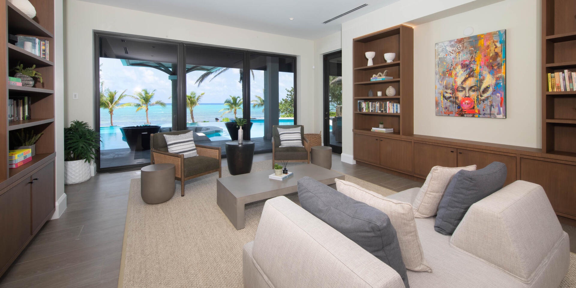 Parlor room on the lower level of the main villa with walkout access to the pool deck.