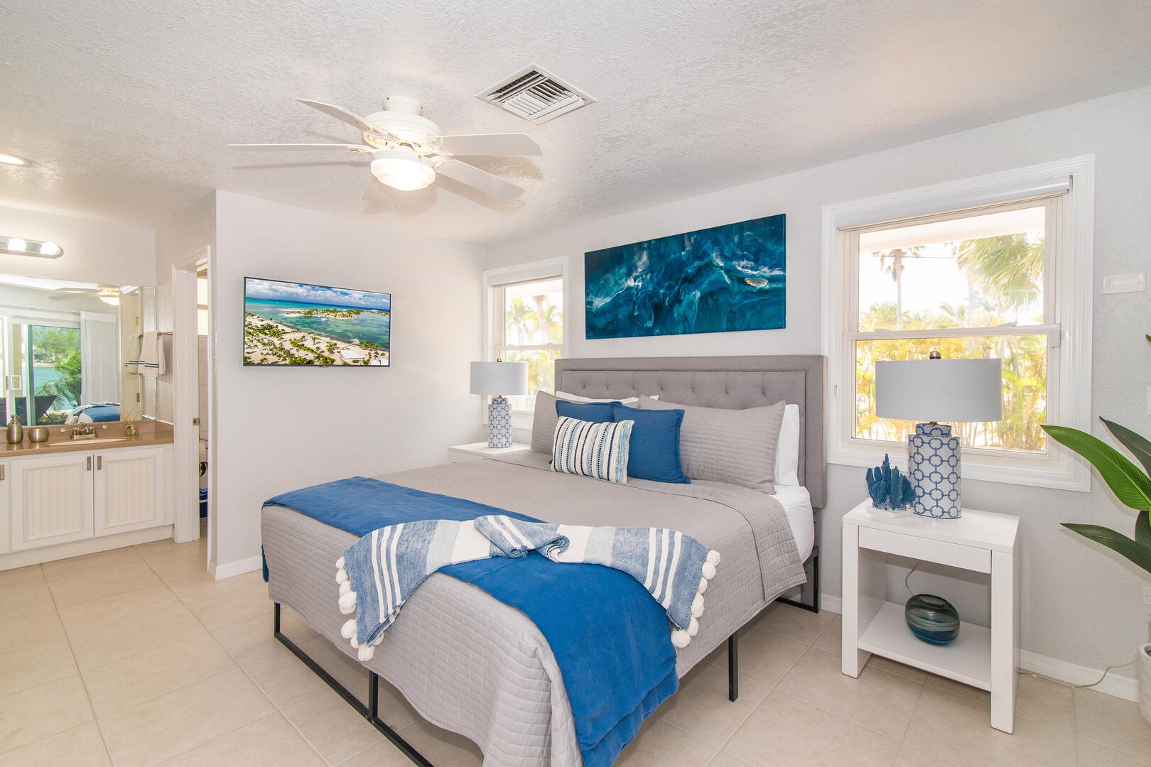 Primary Suite with king bed and SmartTV.