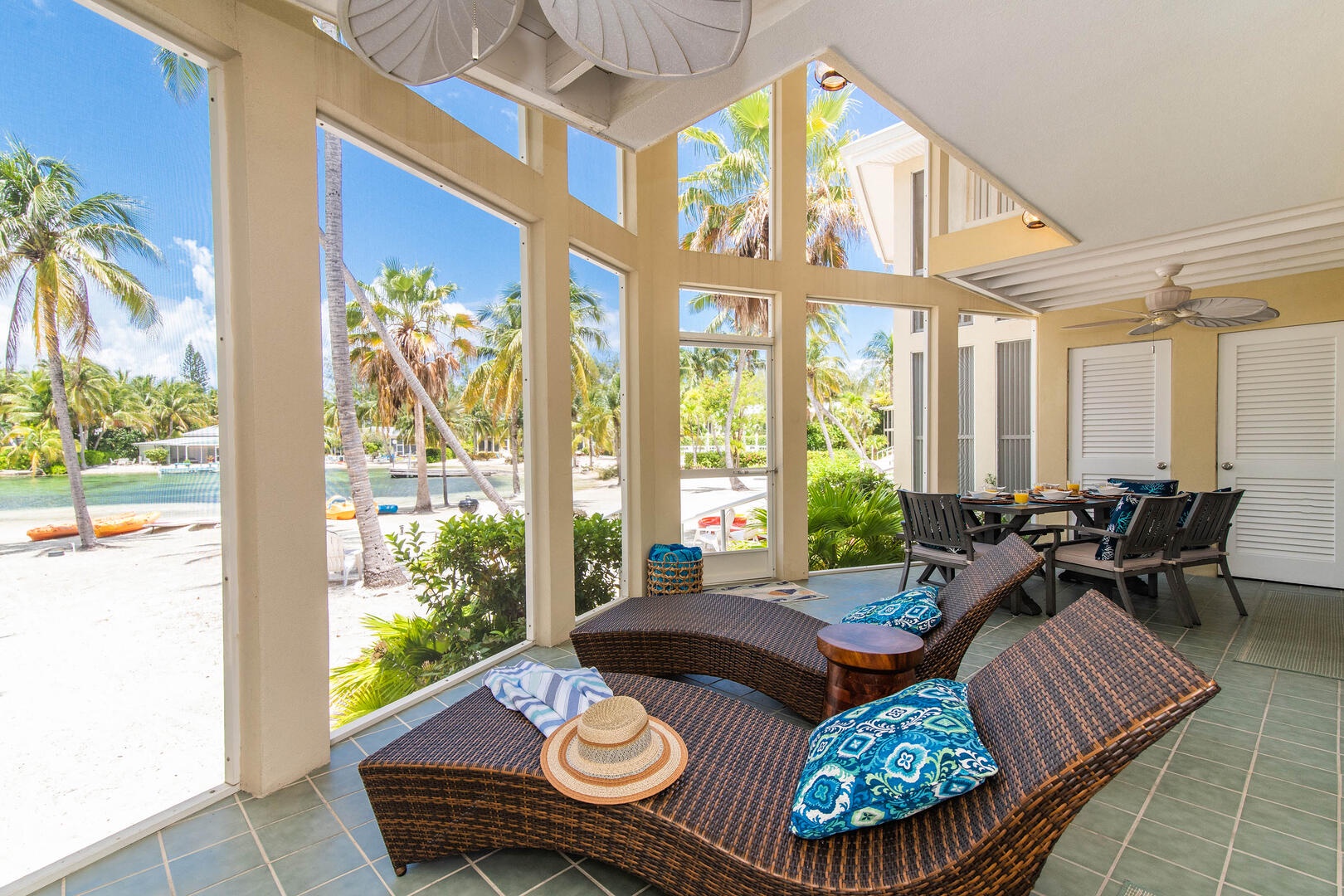 Slide into these loungers and soak up the tropical views from the screened atrium.
