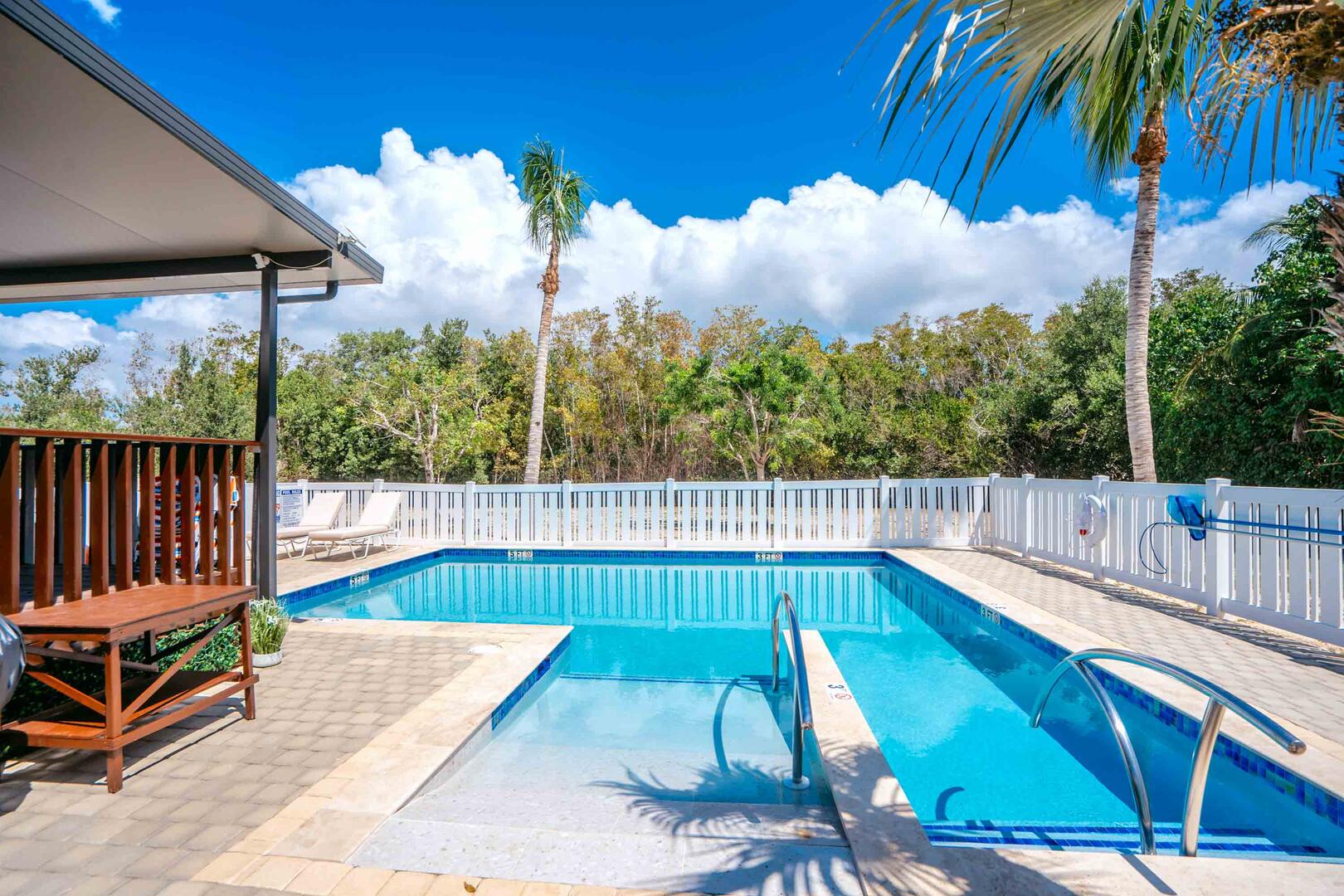 The pool includes a zero-entry slope for gentle water entry.