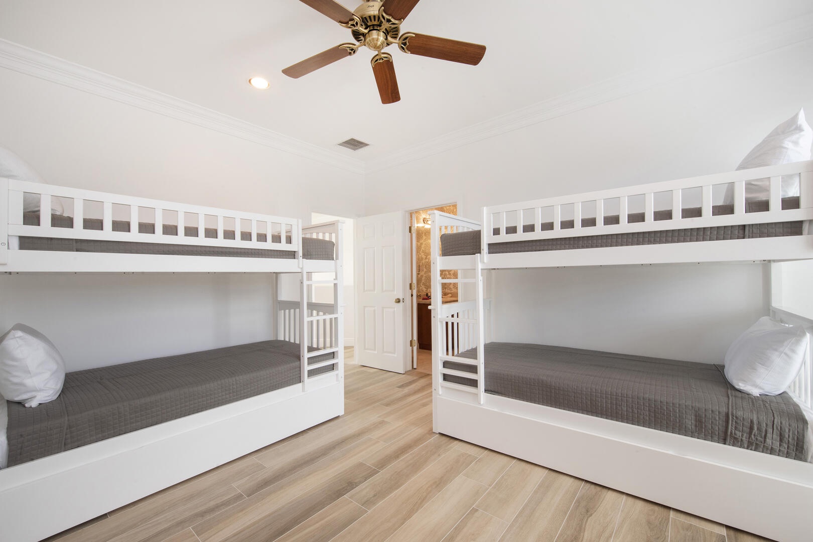 Bunk Suite is furnished with 4 bunk beds and 2 pull out trundle beds.