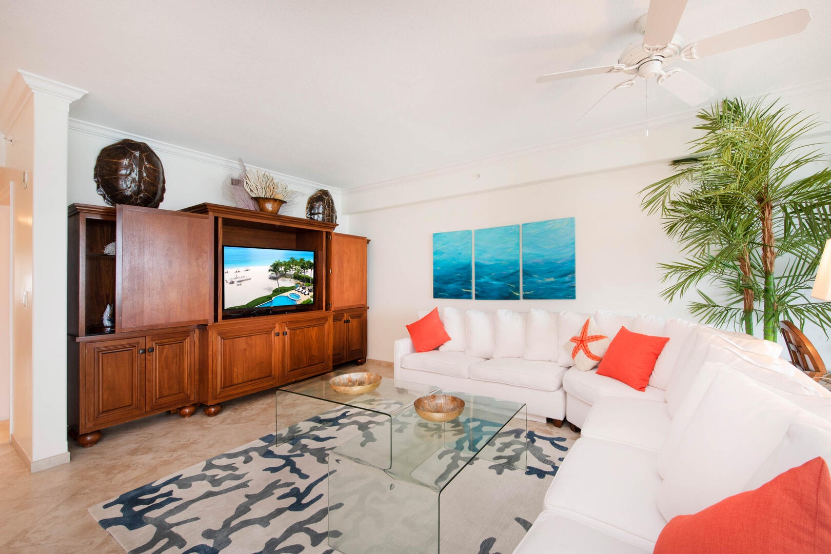 The living area is equipped with a cable HD TV.