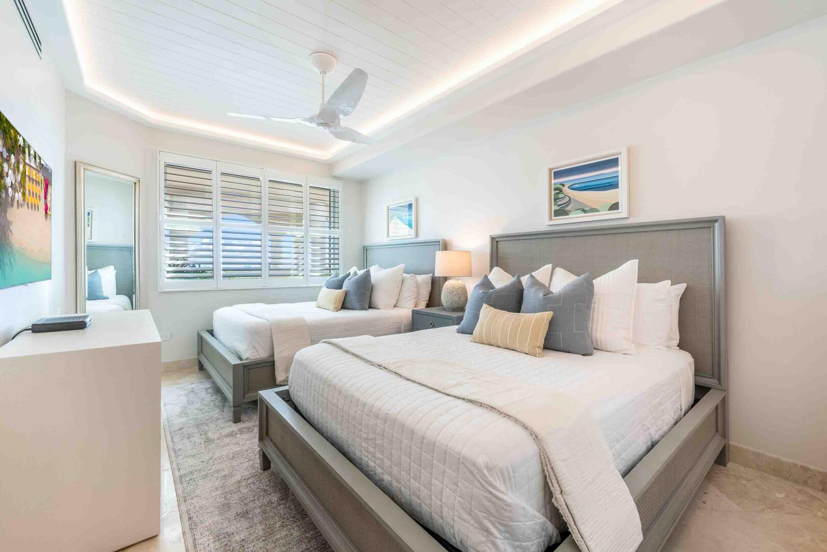 Guest Suite #2 comes furnished with two queen beds and a HD cable television.