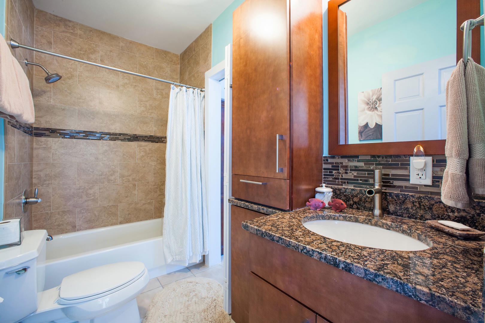 Bedroom 2 ensuite with shower bath.