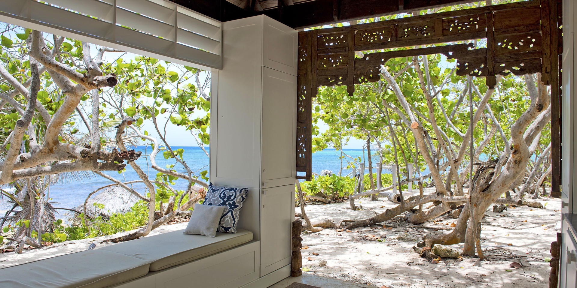 Beautiful inspiration cabana with a lounger that makes a perfect reading nook.