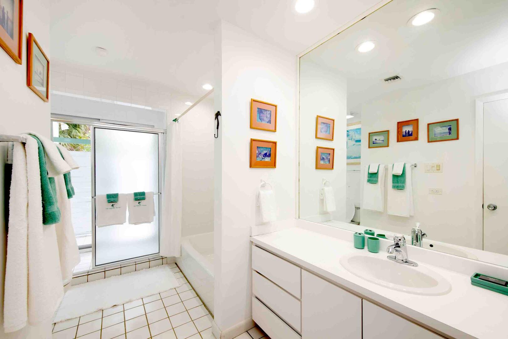 Bedroom 3 ensuite with shower bath and walkout access to the beach.