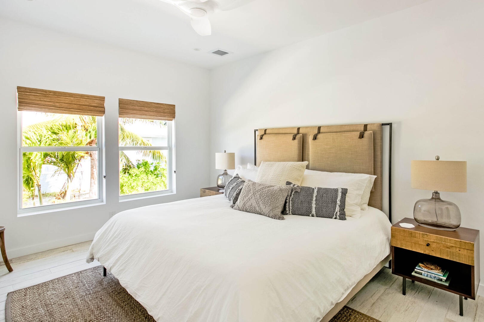 Bedroom #1 on the lower level with island views and a king bed.