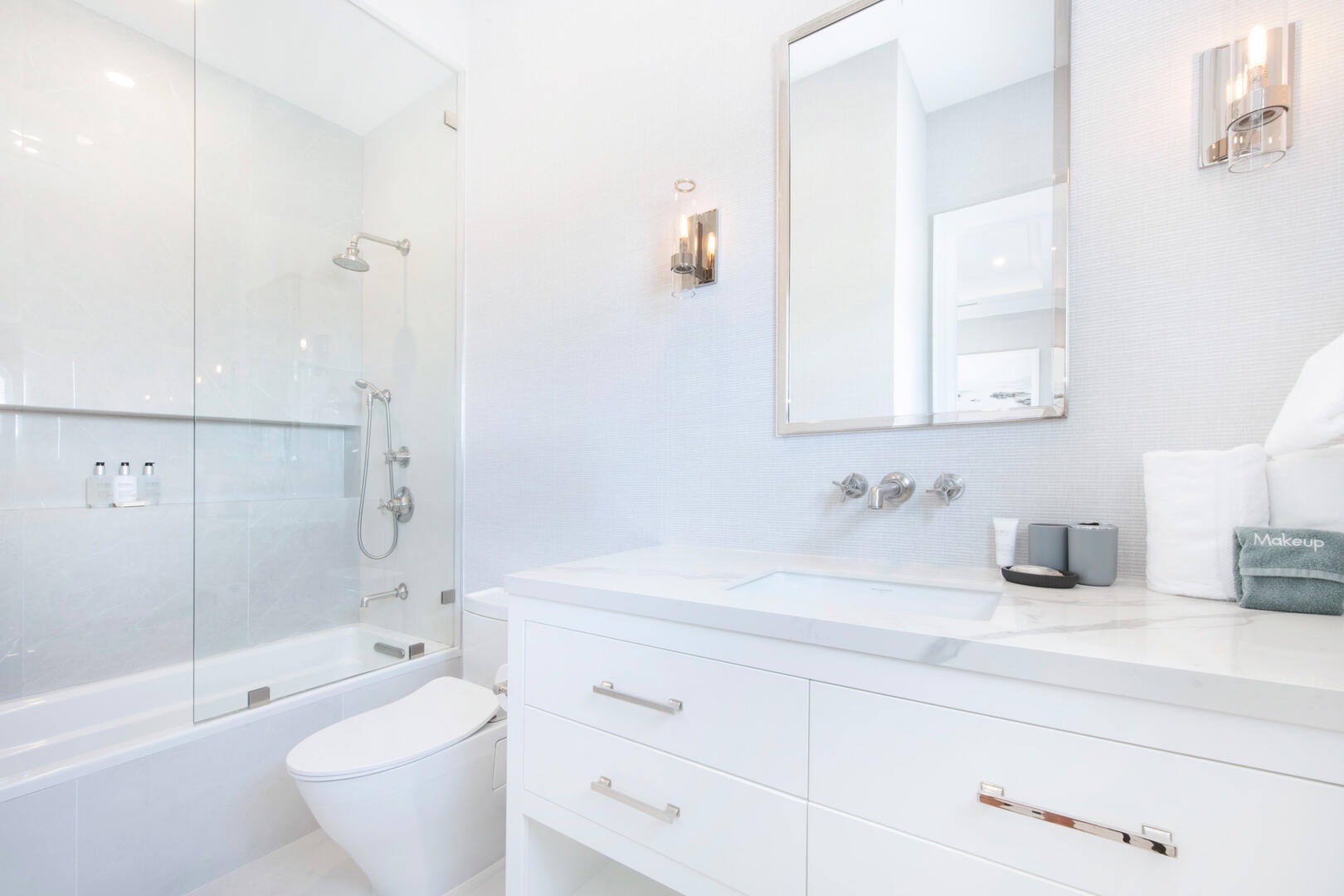 Guest ensuite #2 with shower bath.