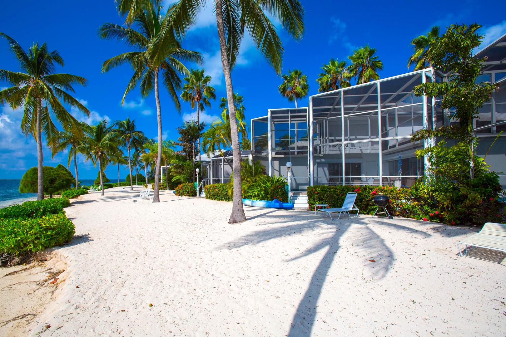 White sandy beachfront steps off the back door.