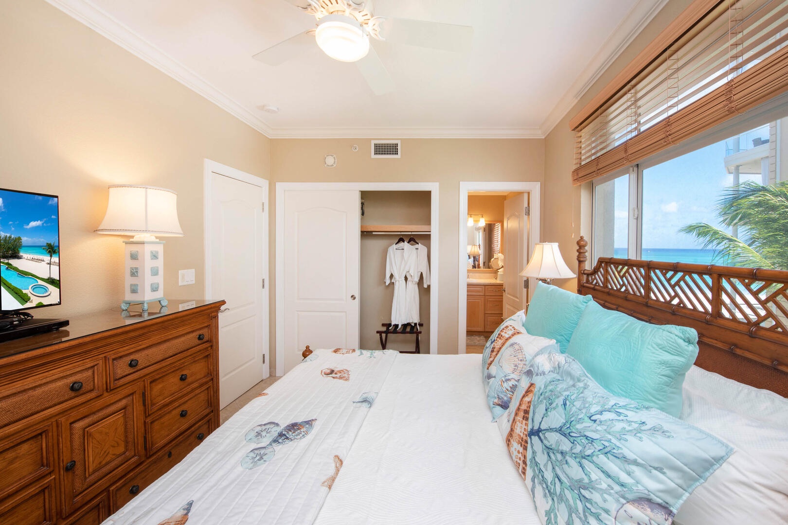 Guest Suite #2 furnished with television and two twin beds that can be fitted into a king bed upon request as shown here.